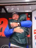 Mark Shepard receives an emotional hug from his pal, Frank Allen, after winning the EverStart Series tournament on Lake Eufaula.