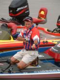 Craig Powers prepares for another day of competition on the Red River.