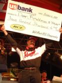 Pro angler Dean Arnoldussen of Kaukauna, Wis., collected $400,000 Saturday after weighing in three walleyes that registered 11 pounds, 2 ounces in the final round to win the $1.4 million Wal-Mart RCL Walleye Circuit Championship?the richest tournament in walleye fishing history.