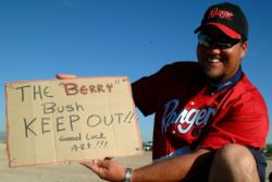Secret admirer or mystery fan? Pro Art Berry shows off a sign he found while fishing at his prime location at the EverStart Lake Pleasant event in 2003. The humorous message, attached to a submerged piece of timber, is still a mystery to Berry as he has yet to figure out its author.
