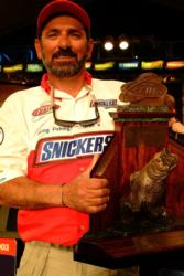 Paul Elias of Pachuta, Miss., shows off his first-place trophy after winning the FLW Tour event on the Atchafalaya Basin. The win represented the first FLW victory of his career.