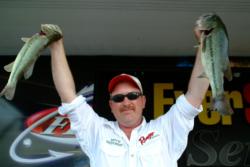Mitch Greenwood of Beechmont, Ky., used a 9-pound, 13-ounce catch to finish the day in first place in the Co-angler Division heading into tomorrow