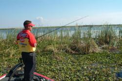 Tyson pro Todd Ary is pictured doing what some pros will be doing on Okeechobee during the first FLW Tour event of 2004: flipping thick mats of vegetation.