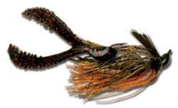 The FLW Jig, shown with a matching FLW Jig Trailer, comes through thick cover well yet easily penetrates a bass's mouth on the hookset. The hook guard comes trimmed the way the pros like it.