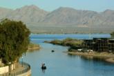 Anglers work in the canal that leads out into Lake Havasu from the city.