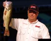 Miles Johnson of Beaver Creek, Ohio, stands with his 5-pound, 14-ounce Lake Hamilton lunker.