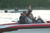Pro leader Bryan Hudgins of Orange Park, Fla., waves as his boat number is called.
