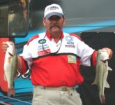 Co-angler Eric Braden of Radcliff, Ky., is in second with a two-day total of 24 pounds, 4 ounces.