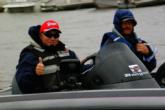 TV fishing host Bob Izumi gives the thumbs-up as he and co-angler Scot Keefe head out for Friday