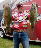 Pro Shinichi Fukae hoists a couple of the monster bass for which he became famous in 2004 on the FLW Tour.