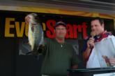 Pro Daryl Deka of Wellington, Fla., holds up the kicker bass of his 21-pound, 12-ounce winning string.