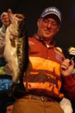 Kelly Jordon of Mineola, Texas, holds up part of his winning 30-pound, 13-ounce stringer.