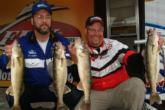 Nick Johnson and Jim Schleicher hold up their 12 pound, 9 ounce catch.