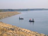 Anglers in the EverStart Southeastern on West Point Lake share a stretch of riprap at the dam