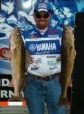 Ross Grothe of Northfield, Minn., shows off two massive Green Bay walleyes that helped put him in a tie for fifth place.