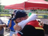 Craig Powers gets an emotional hug from his wife Kristi.