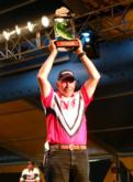 Robert Lampman holds up his trophy after winning the 2005 Wal-Mart FLW Walleye Tour Championship on the Mississippi River.