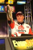 Jerry Green of Justiceburg, Texas, shows off the kind of spotted bass he caught all week to finish fifth.