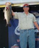 Mark Linn of Sarasota, Fla., leads the Co-angler Division thanks in large part to this 8-pound bass, which anchored his limit weighing 12-12.