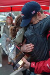 Andy Scholz of Reno, Nev., embraces his wife, Jeannette, upon winning the co-angler title on Clear Lake.