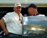 Pro Trent Huckaby of Fort Stockton, Texas, talks with Stren Central Tournament Director Ron Lappin. Huckaby is in fifth with five bass, 11 pounds, 1 ounce.