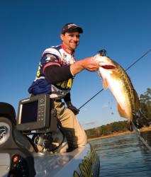 Pro Jonathan Newton uses his electronics to target big bass. Networking your front and back graphs keeps you fishing without having to go back and forth to check your waypoints and marked brush.