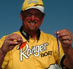 Jimmy Reese shows off some of his winning baits at the Delta: a crawdad-orange Rat-L-Trap and a Maragarita Mutilator Roboworm.