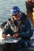 Terry Bolton gets his tackle together for another day of structure fishing on Kentucky Lake.
