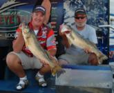 Pro Mark Courts and co-angler Todd Mueller hold up part of their day-two catch from Green Bay. Mueller sits in third place on the co-angler side. 