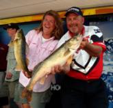 Pat Neu and Kristine Szczech show off their day-three catch. Szczech now owns a slim lead in the Co-angler Division.