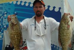 Co-angler Tim George qualified for the semifinals in second place with a catch of 34 pounds, 2 ounces.