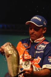 Clark Wendlandt is splashed by one of the bass that helped him take third place and $40,000.
