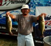 Pro Lloyd Pickett of Bartlett, Tenn., shows off two kicker fish caught Wednesday on the Mississippi River.