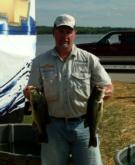 John Farmer caught four bass on Thursday that weighed 9 pounds, 7 ounces to take the lead in the Co-angler Division. 