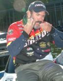 Pro Larry Nixon of Bee Branch, Ark., gets a head start on readying his tackle for the finals.