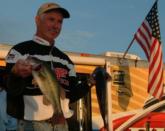 Co-angler Spencer Lynn of Vinemont, Ala., shows off his tournament winning catch.