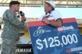 Pro Mike Goodwin of Lake Havasu City, Ariz., is congratulated by a member of the Army National Guard after winning the first-ever Wal-Mart FLW Series Western Division event on Lake Havasu.