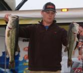 No. 5 co-angler Kyle Shirley shows off a 7-pounder and another bass from his day-three catch.