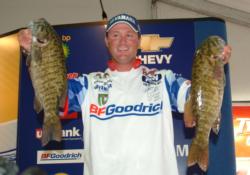 Pro leader Chad Grigsby shows off two huge smallmouths caught on day one.