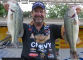 Fresh off an FLW Tour win at Lake Norman, Chevy pro Larry Nixon of Bee Branch, Ark., weighed in the tournament's heaviest stringer for 21 pounds, 9 ounces to vault him into third place.