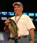 Thomas Southern holds up a bass from his day-one catch of 6 pounds, 1 ounce, good for fourth.