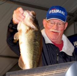 Pete Bridges weighs in the Snickers Big Bass on the co-angler side with this 6-8 fish.
