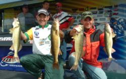 Pro Jason Przekurat and co-angler Trent McLaughlin hold up their day-three catch. Przekurat is third and McLaughlin first in their respective divisions.