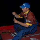 Snickers pro Pat Fisher dyes some soft plastics before the start of day four.