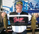 Richard Schumacher caught 21 pounds, 7 ounces of bass the first two days to lead Connecticut by only 3 ounces.