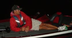 Pro leader Jason Christie relaxes on the deck of his boat Saturday morning.