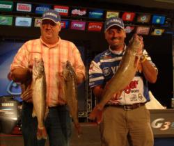 Pro Ross Grothe and co-angler Richard Ness hold up their day-one catch from Lake Erie.