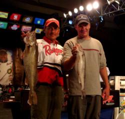 John Gillman and Mike Zawistowski hold up part of their day-two catch. Gillman finished the opening round third in the Pro Division and Zawistowski finished second in the Co-angler Division.