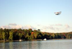 A plane flies over Grand Traverse Bay in Michigan, site of a 2007 Fish with the Pros event.