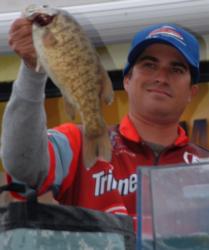 Pro Justin Kerr of Simi Valley, Calif., shows off part of his winning stringer during the Stren Series event on Lake Havasu.
